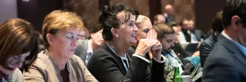LL&M Congress attendees listening to a session