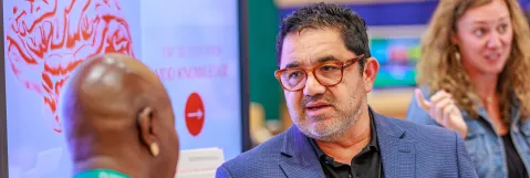 Attendees interacting 