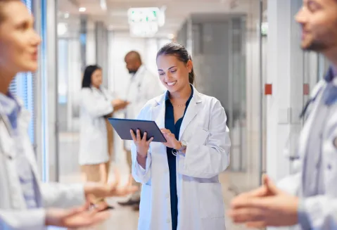 Doctor looking at chart