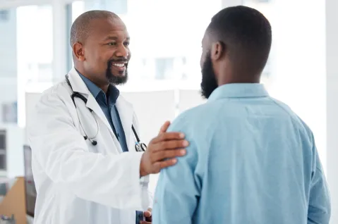 Doctor talking to patient