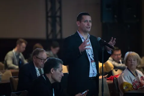 man speaking during the Q&A