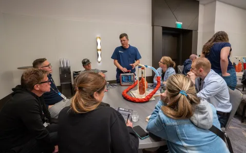 ems world live attendees working together