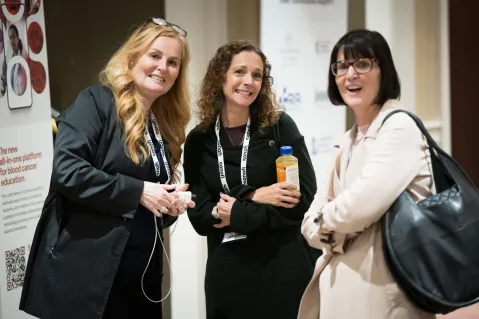 3 women smiling 