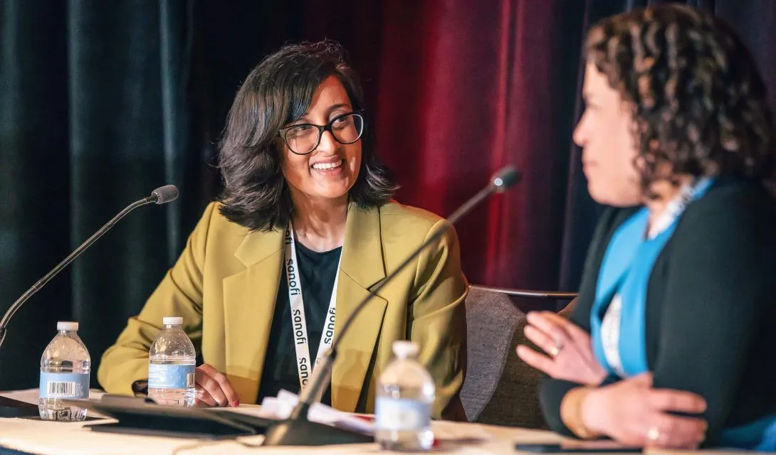 LL&M Great Debates - speakers talking to each other on stage