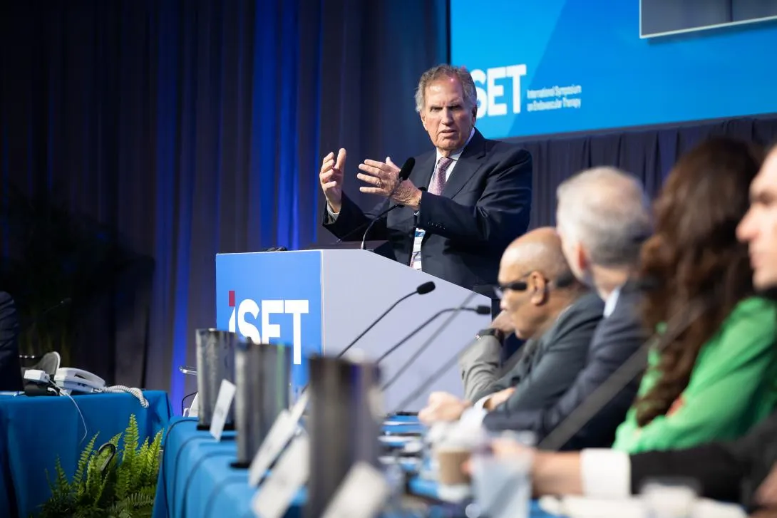 Dr. Barry Katzen speaking at podium