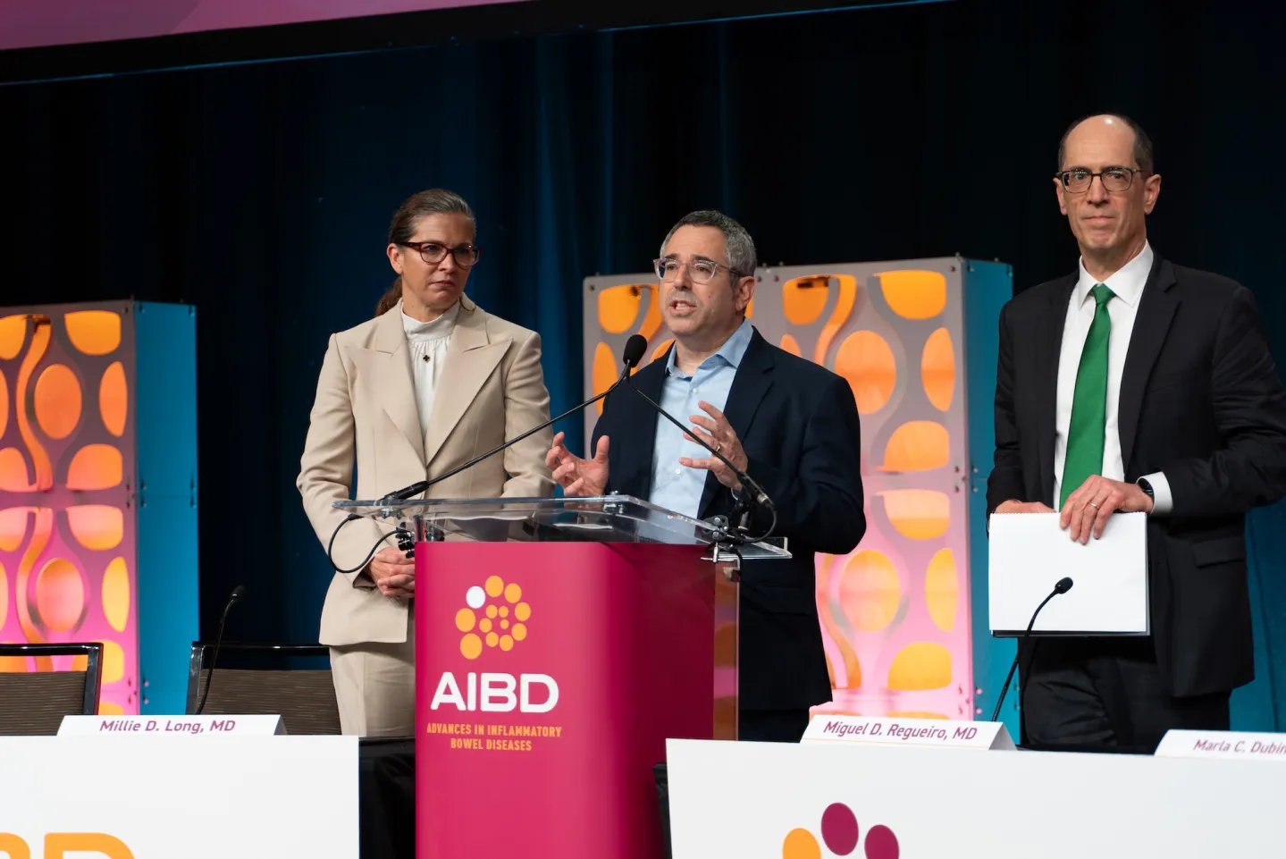 Dr. Millie Long, Dr. Corey Siegel, and Dr. Miguel Reguiro at AIBD 2025