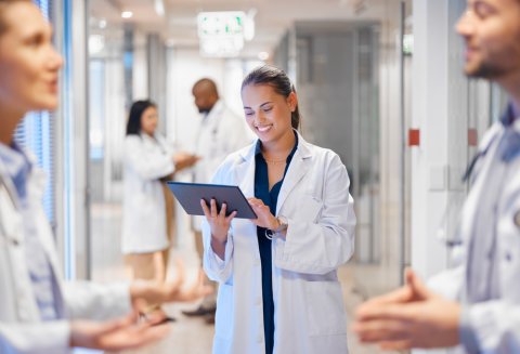 Doctor looking at chart