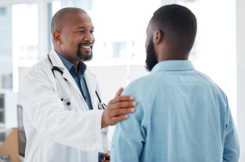 Doctor talking to patient